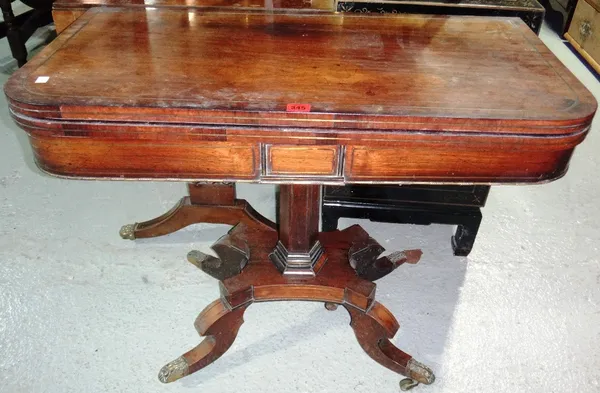 A 19th century rosewood and brass inlaid card table.