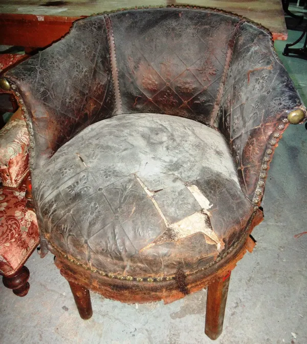 A 19th century French leather upholstered swivel tub chair.