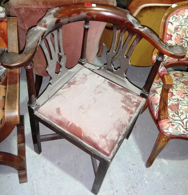 A George III mahogany framed double vase back corner chair.