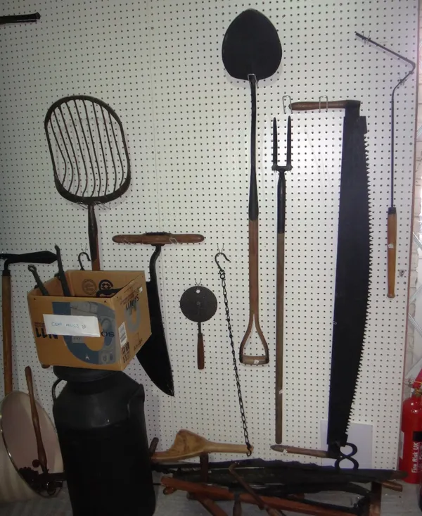 A quantity of assorted farm and vintage tools.
