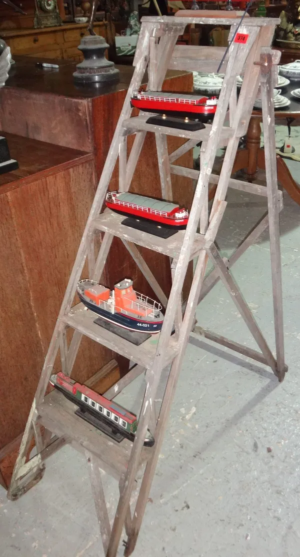 An early 20th century step ladder.