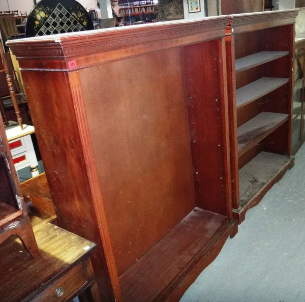 A pair of 20th century yew wood adjustable bookcases.