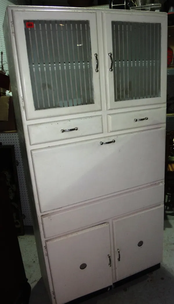 A 1950's white painted kitchen cupboard.