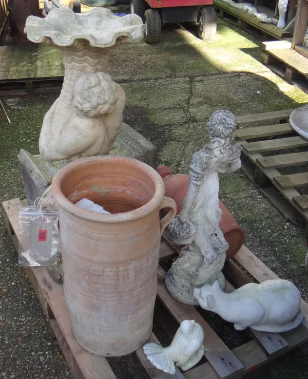 A quantity of garden statuary to include, a stone figure of a boy holding cornucopia, a plinth, a stone cat, a dove and sundry.
