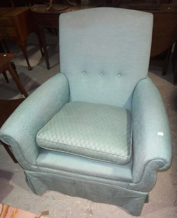 A 20th century mahogany framed green upholstered armchair.