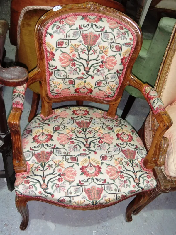 A walnut framed fauteuil and a walnut framed button back nursing chair. (2)