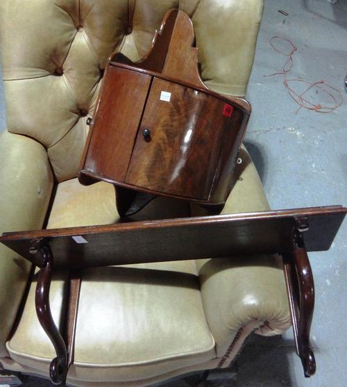 A 19th century mahogany bowfront corner shelf with a cupboard, and a mahogany single wall shelf. (2)