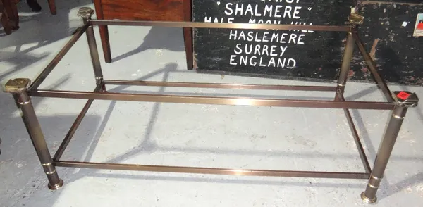 A 20th century brass and glass coffee table.