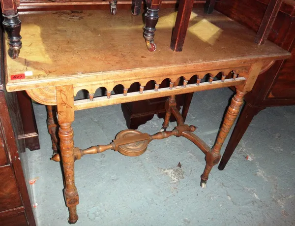 An Arts and Crafts walnut writing table by 'Cochayne', Sheffield.