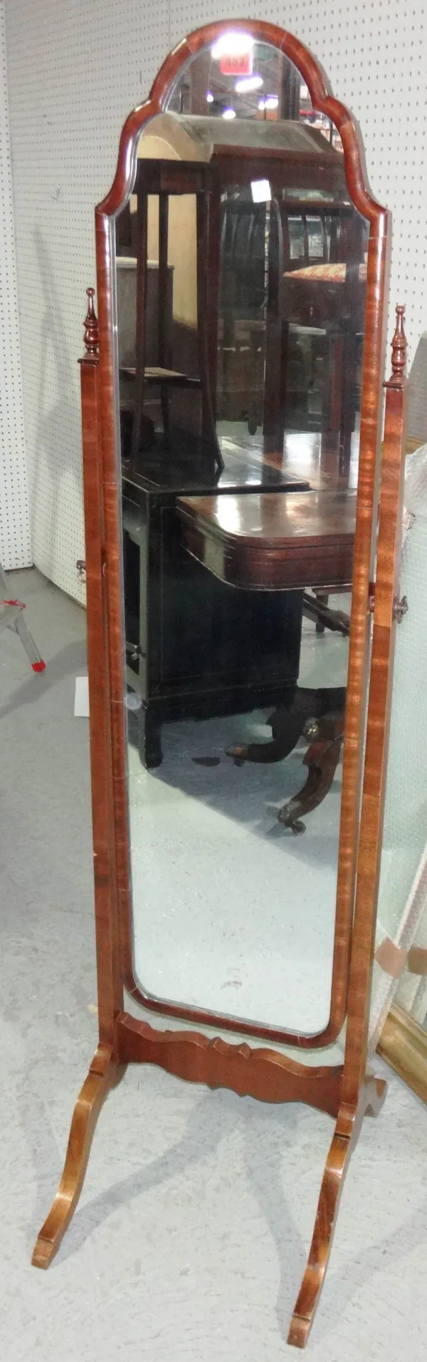 A George III style pot cupboard and a 20th century mahogany cheval mirror (2).