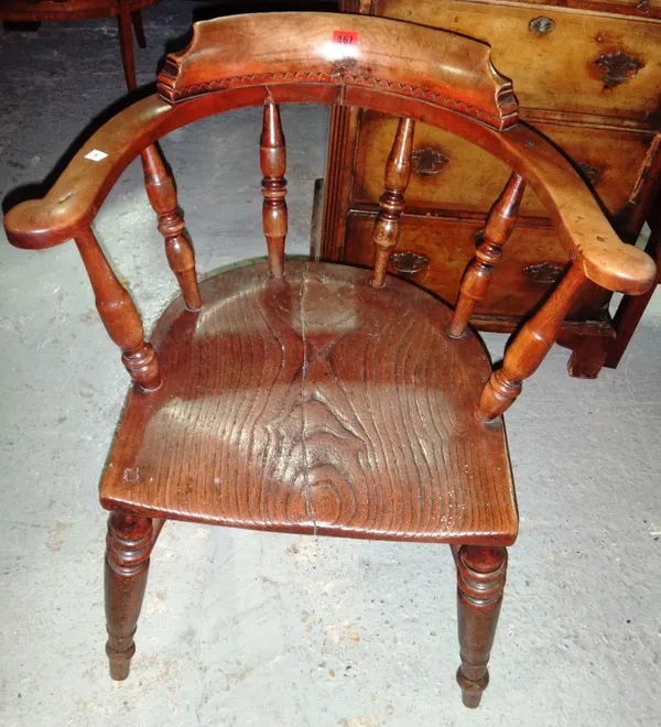 A 19th century bow back scullery chair with elm seat and another scullery chair.