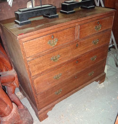 A 19th century oak chest of two short and three long drawers.