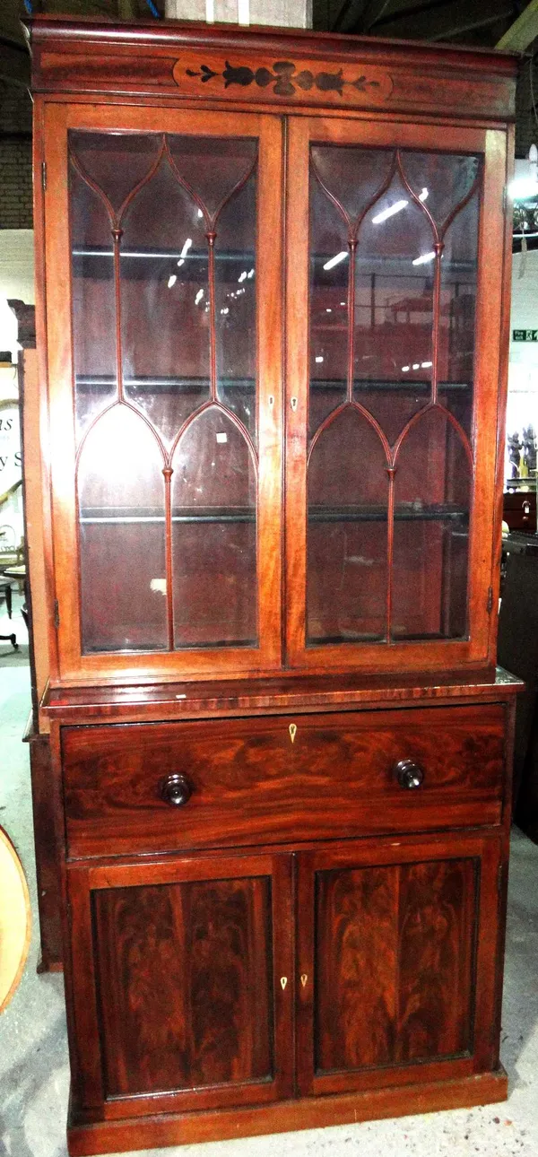 A Victorian mahogany secretaire cabinet with glazed top section.