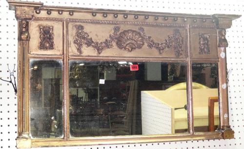 A 19th century gilt and gesso triple plate mirror.