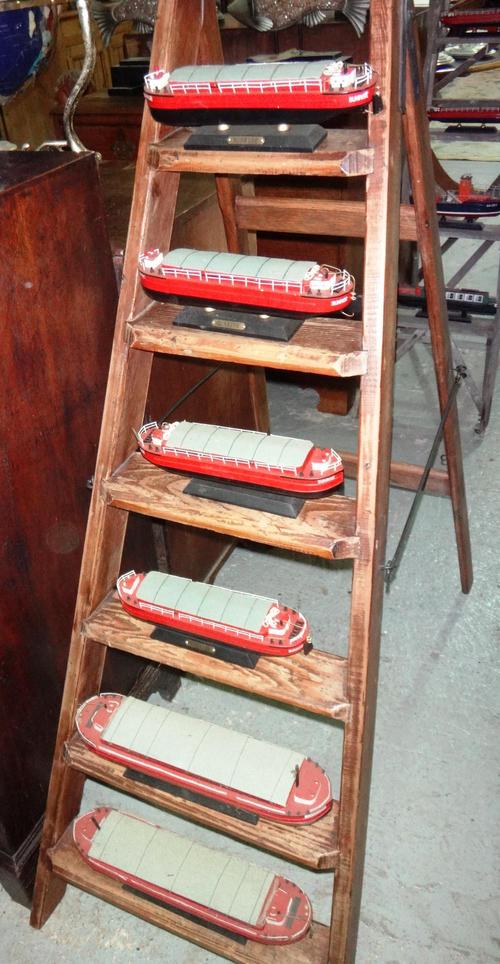 A quantity of 20th century decorative models of boats, including sailing vessels, canal boats and sundry.