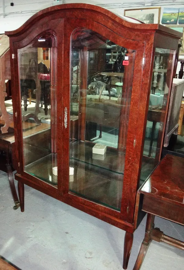 A 20th century mahogany display cabinet.