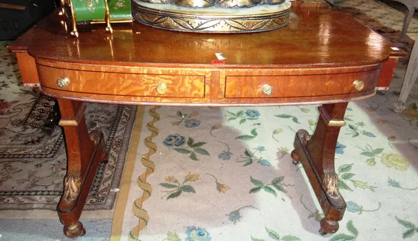 A late 19th century mahogany and burr ash side table of George III design, the bowfront with pair of frieze drawers, on parcel gilt trestle end standa