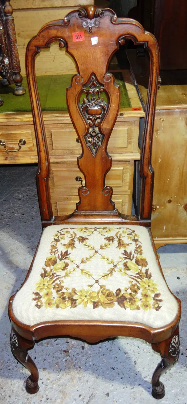 A Dutch carved walnut side chair.