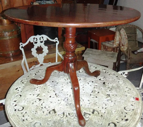 A 19th century mahogany circular tripod table.