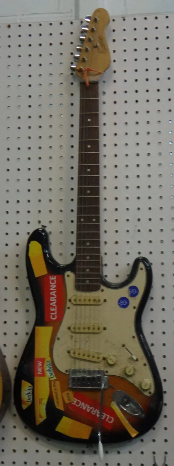 An 'Encore' Sunburst electric guitar