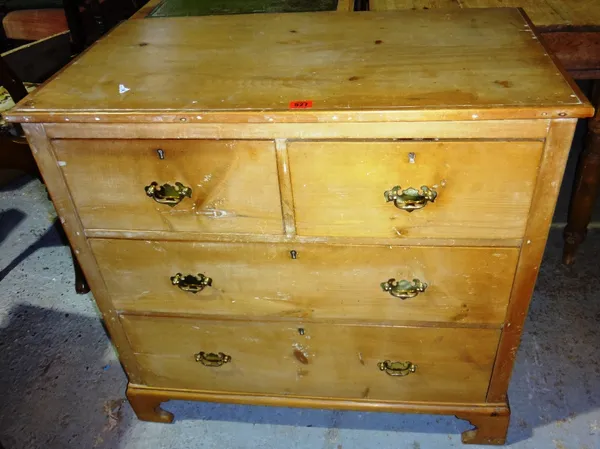 A 19th century pine chest of two short and two long drawers.
