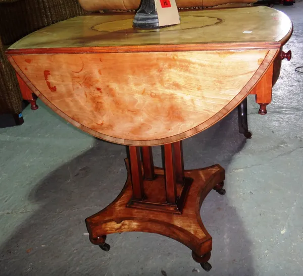 A 19th century satinwood pedestal drop flap table.