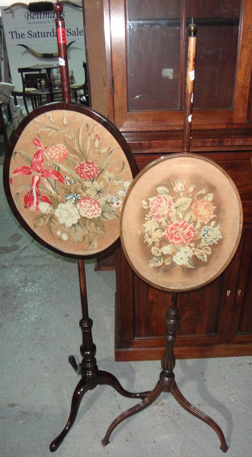 A mahogany framed pole screen and another (2).