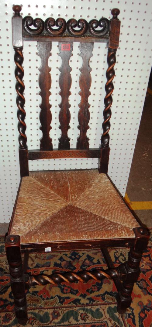 A set of six 20th century oak dining chairs, with reeded seats and barley-twist stretchers.