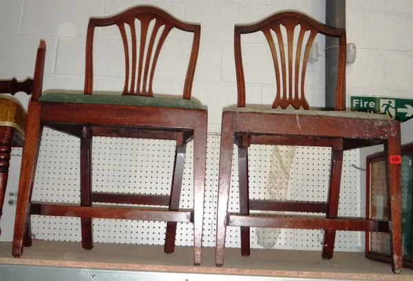 A pair of 19th century mahogany dining chairs with pierced back splats.