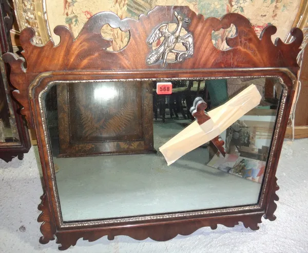 A George III style fret cut pier mirror with hoho bird surmount.