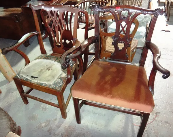 A George III mahogany open armchair and another similar.
