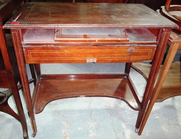 Ad Edwardian mahogany and inlaid lift top writing desk.