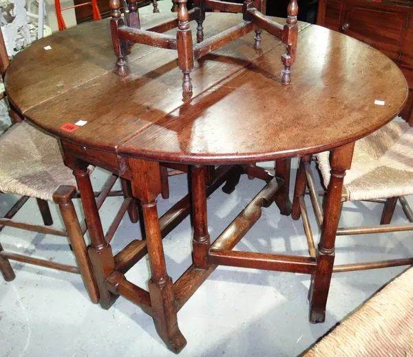 A 19th century oak drop flap gateleg table.