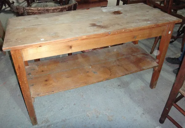 A long rectangular pine two tier table.