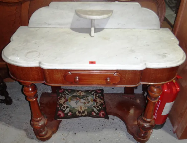 A Victorian mahogany marble top washstand.