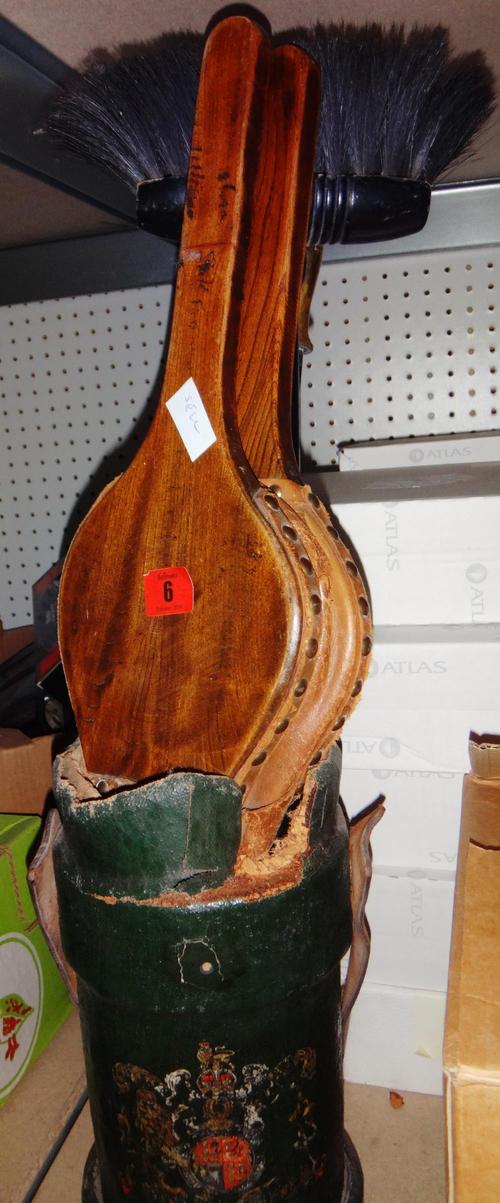 A green leather painted shot carrier, wooden bellows and sundry fire tools.