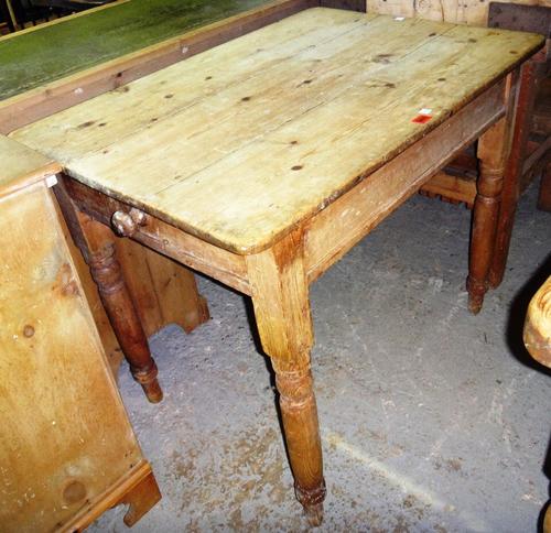 A 19th century pine rectangular kitchen table and a two tier pine occasional table.