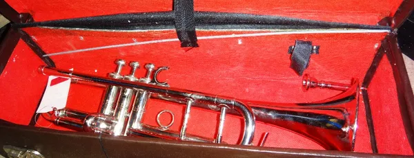 A 20th century silver plated trumpet, with a case.