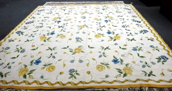A needlework carpet, ivory field, floral spray design, 350cm x 345cm.