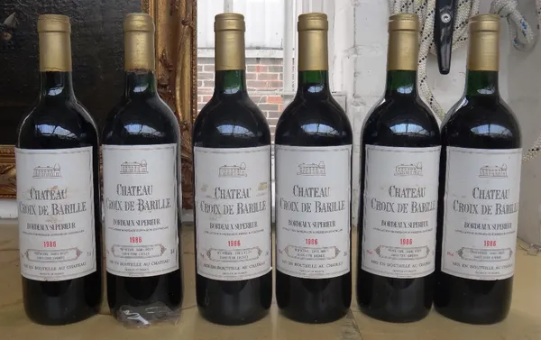 Ten bottles of 1986 Chateau Croix de Barille, one bottle of 1985 Chateau Tour du Mirail and one bottle of 1993 Julienas. (12)
