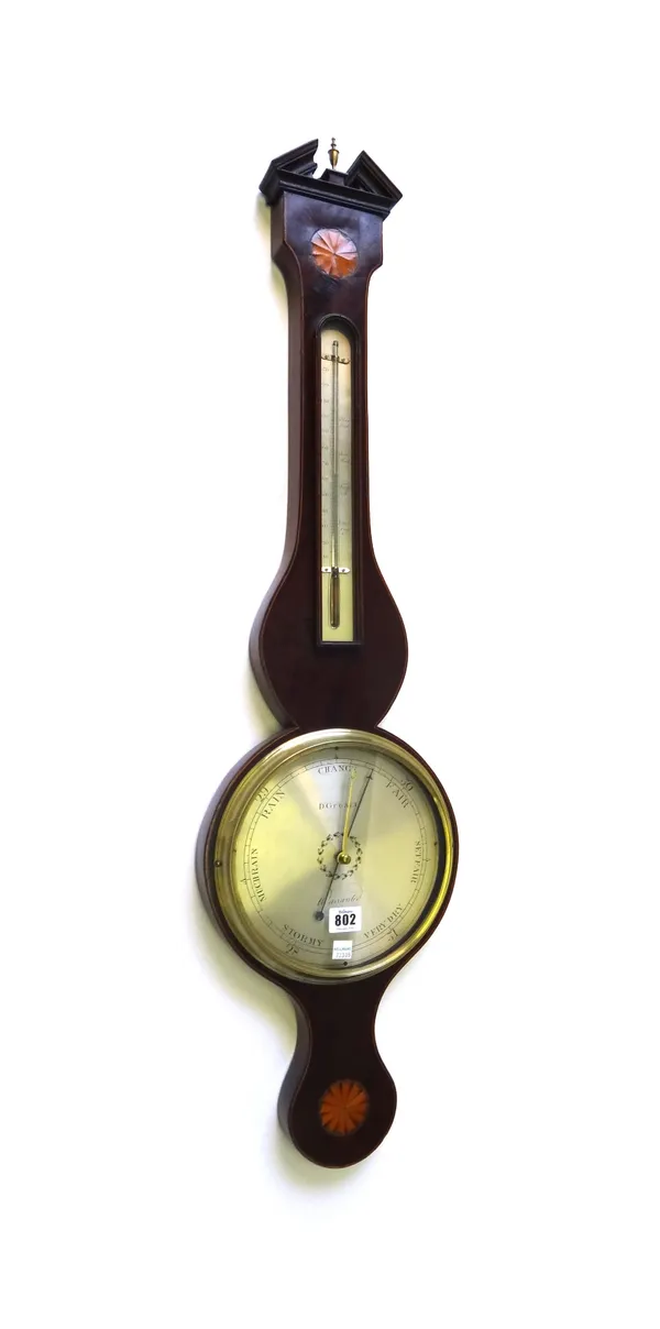 A mahogany and inlaid wheel barometer by 'D. Gugari', late 19th century, with broken arch pediment over a thermometer and a silvered eight inch dial d