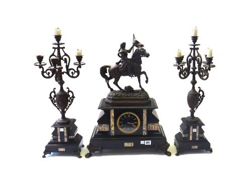 A Victorian black marble and spelter mounted clock garniture, surmounted with a spelter knight on horseback over a black marble case, centred by a gil