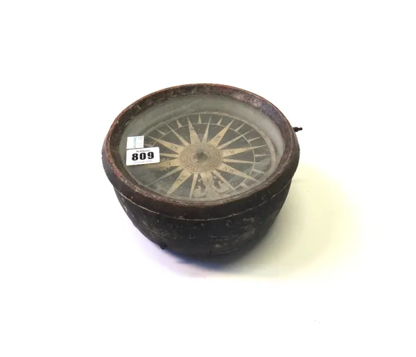 A ship's gimble compass (lacking stand), early 19th century, the paper dial detailed 'Brazier Hardwareman' (a.f),19cm diameter.