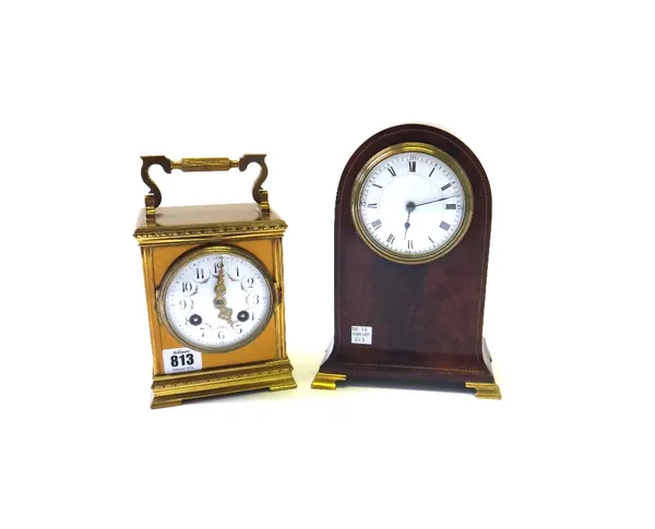 A French gilt brass cased mantel clock, early 20th century, the enamel dial painted with floral swags, on a stepped plinth, enclosing a two train move