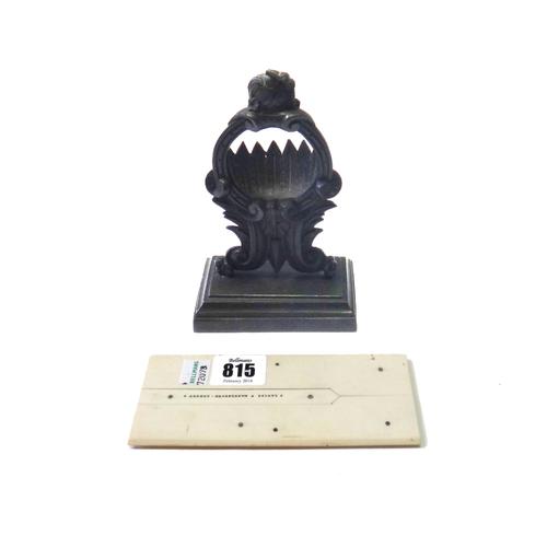 An ivory and white metal mounted parallel rule, 19th century, inscribed 'Davies, Marylebone, London', 15.2cm diameter, and an early 19th century bronz