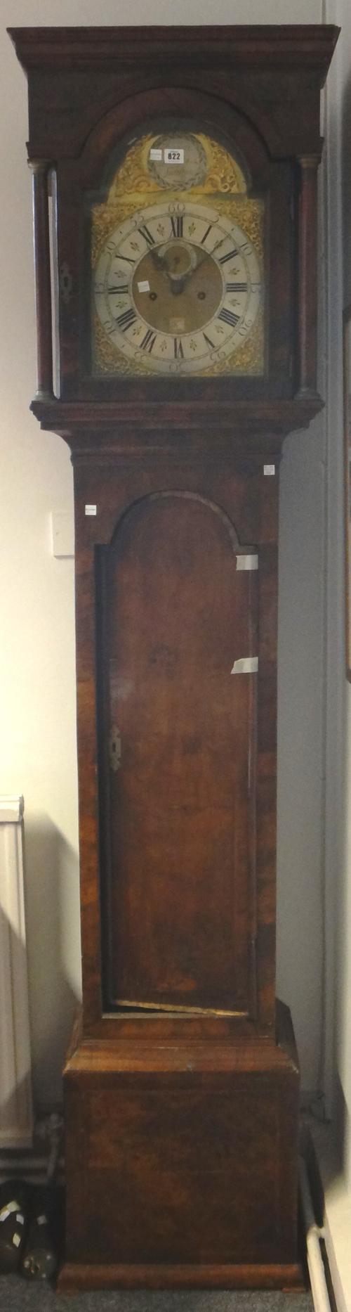 A walnut striking longcase clock, the movement by Joseph Davis, London, mid 18th century (the case late 18th century), the broken arch dial with silve