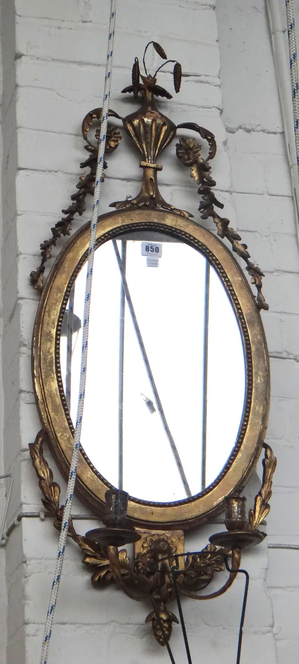 A pair of Danish giltwood and silvered twin branch girandole mirrors, early 19th century with foliate urn surmount over an oval plate embellished with