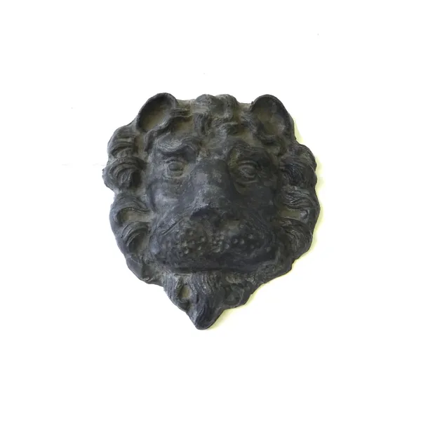 A lead 'lion mask' wall plaque, early 19th century, 25cm high.