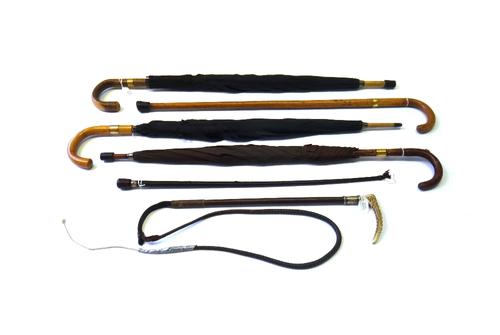 A vintage walking stick with brass collar stamped 'Brigg, London', another similar also stamped 'Brigg, London', another similar, a walking stick with