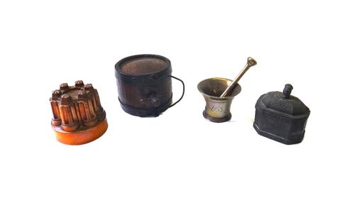 A Benham & Froud copper jelly mould, late 19th century, with six turrets on a circular base, stamped orb mark and no.285 (12cm high), together with a